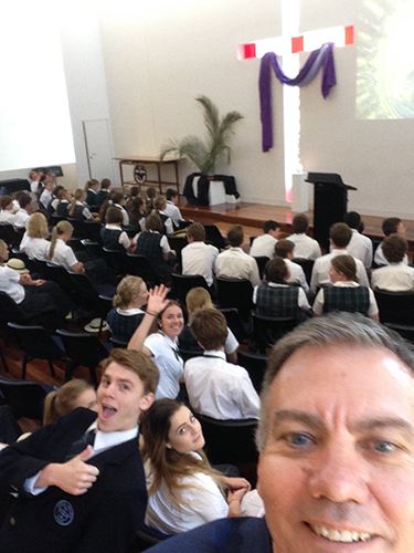 Phil Worrad takes a selfie during chapel at Kinross Waloroi.